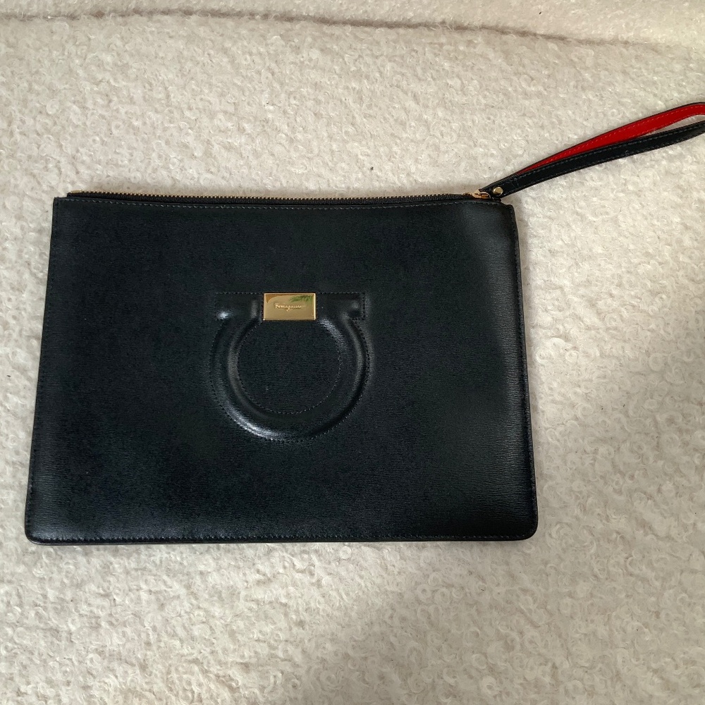 Black Ferragamo leather envelope clutch with strap and contrasting red interior